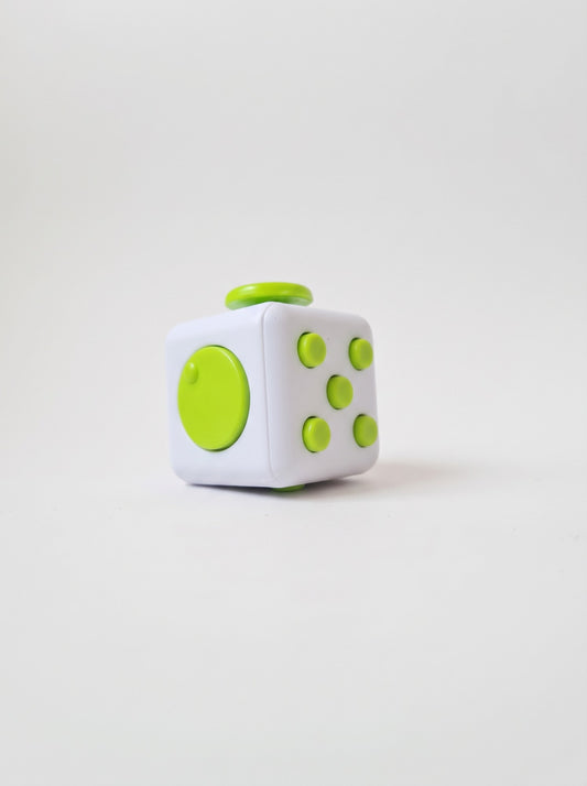Fidget Cube rosado en su blister