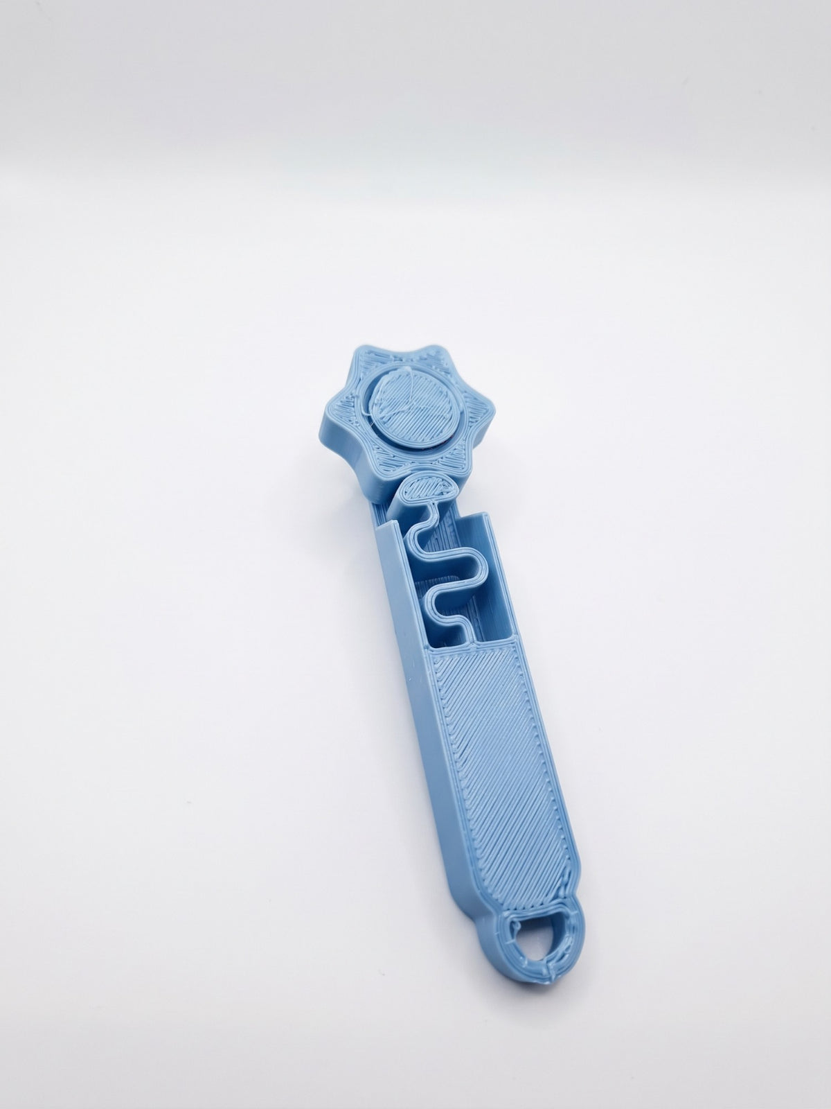 Fidget laberinto y spinner sonoro 3D azul