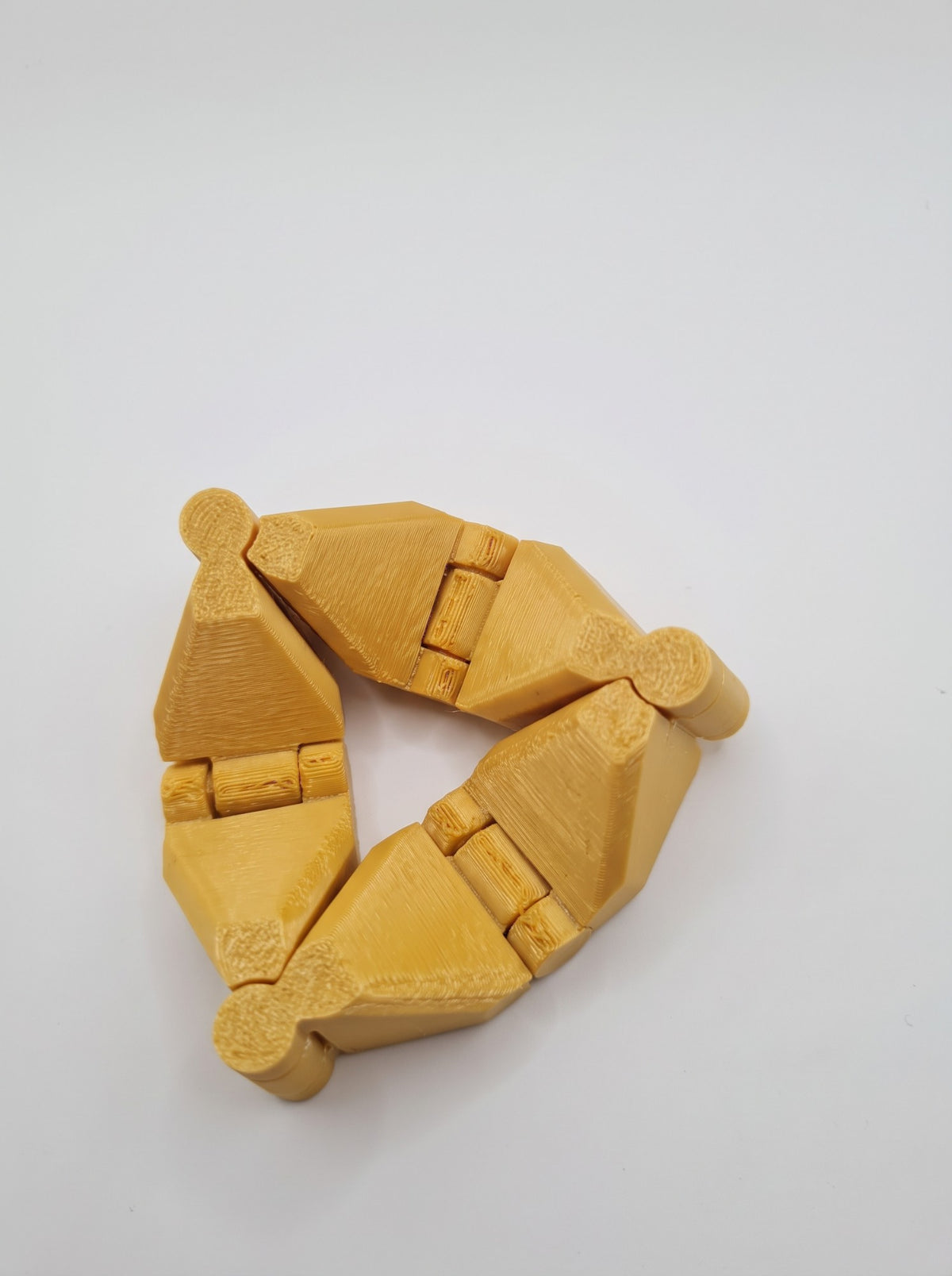 Anillo articulado 3D dorado con bisagras