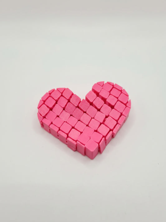 Corazón articulado 3D rosado de cubos flexibles