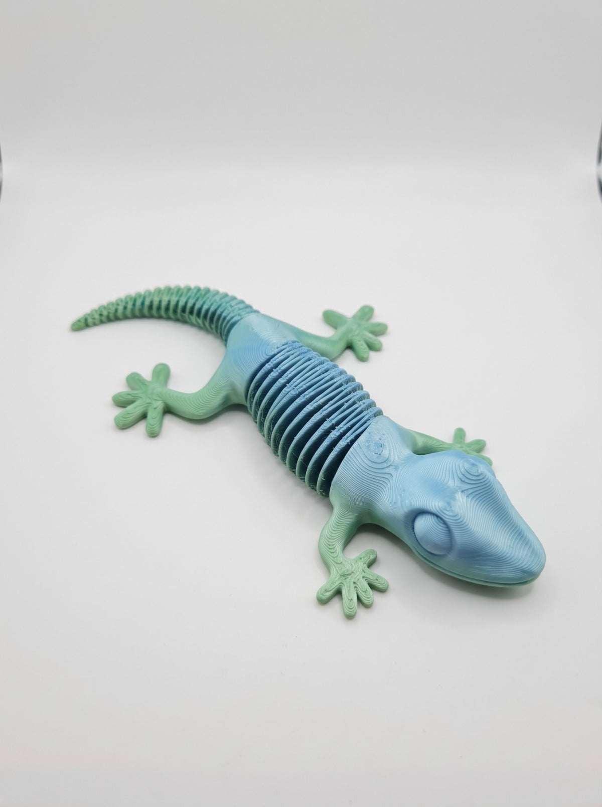 Gecko flexible 3D degradé verde agua y celeste