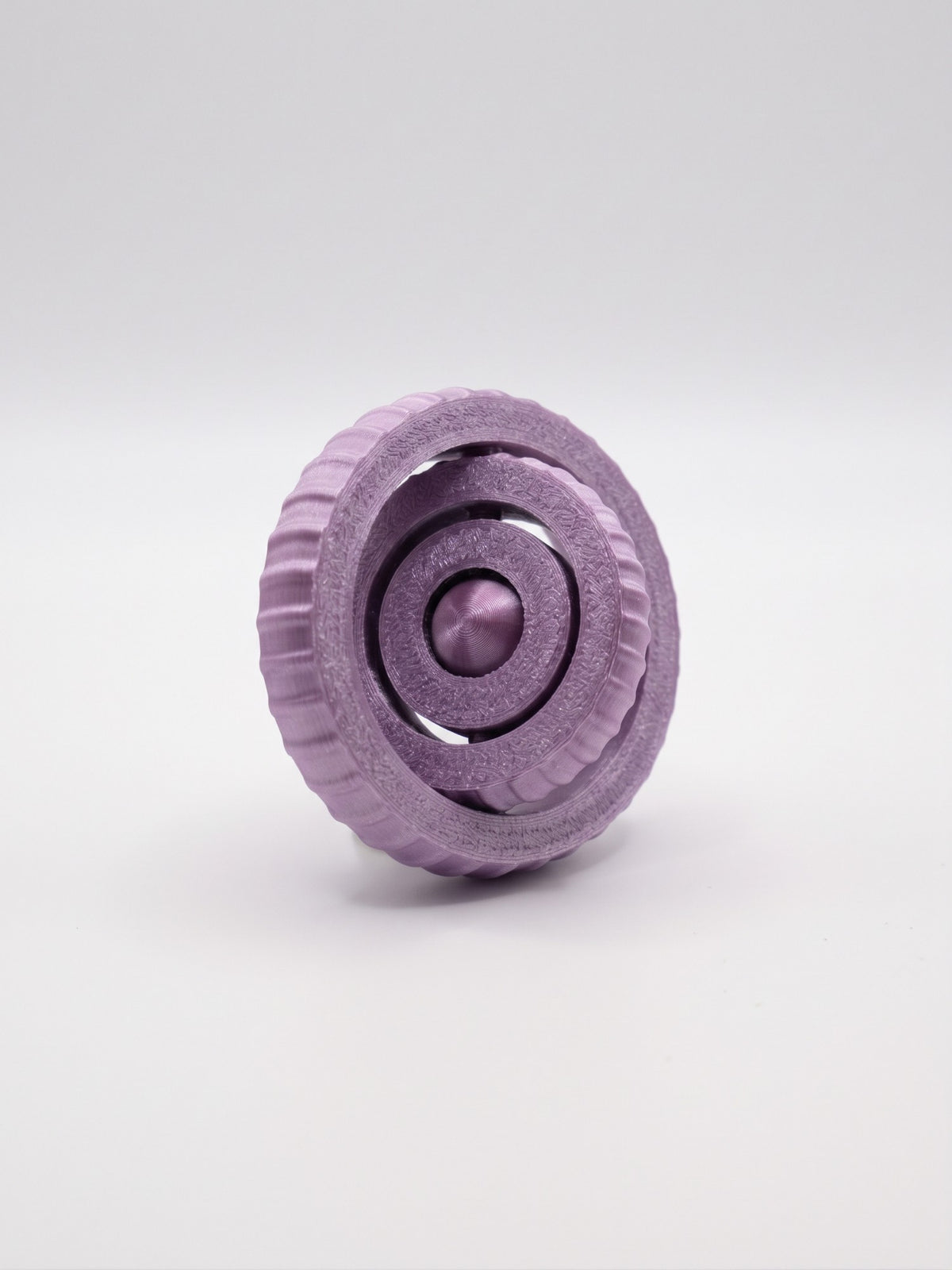 Giroscopio 3D texturizado lila de anillos giratorios