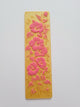 Marcapáginas 3D amarillo con flores rosadas en relieve