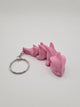 Mini dragón articulado 3D rosado, llavero