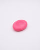 Piedra sensorial 3D fucsia para el pulgar