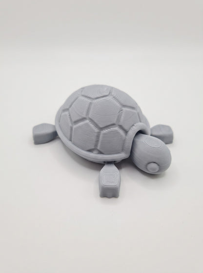 Tortuga articulada 3D gris