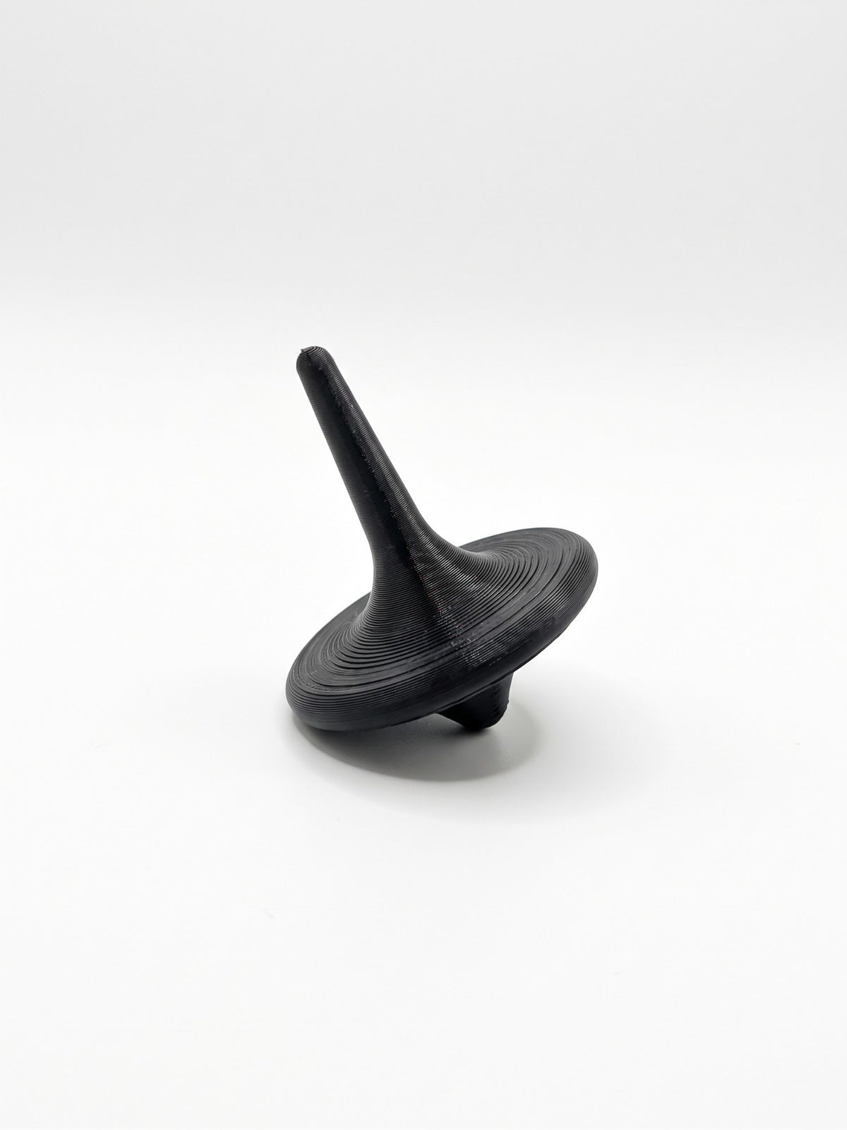 Trompo clásico 3D negro